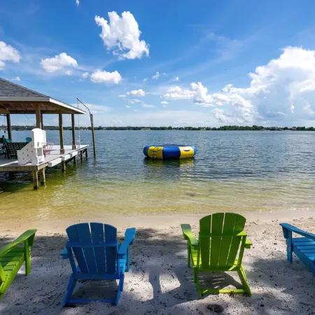 Newer Home on Lake June with Beach, Dock, Screened Patio and Hot Tub!