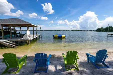 Newer Home on Lake June with Beach, Dock, Screened Patio and Hot Tub!