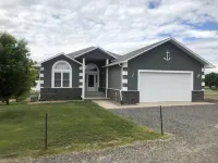 Just steps to the beach.  Lakefront Property with Endless Views.