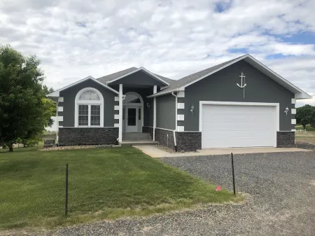 Just steps to the beach.  Lakefront Property with Endless Views.