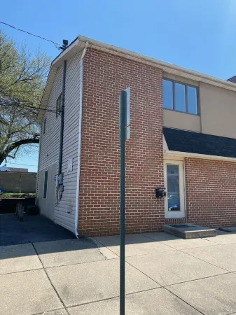 2 Separate Units in one Building w/ Private Entrances and Parking