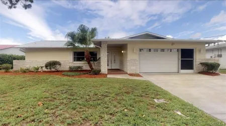 Spacious 3 BR 2 Bath  House On Deep Canal With Screened Heated Pool