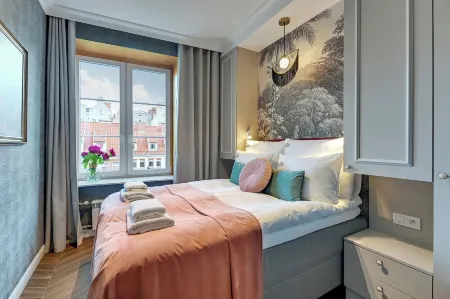 Ogarna Baltus, Main Old Town by Downtown Apartments Отели рядом с достопримечательностью «Ректорская церковь отцов кармелитов Святой Екатерины»