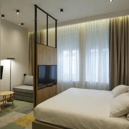 Hop Inn Rooms & Suites