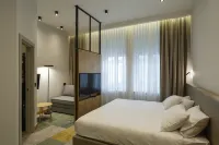 Hop Inn Rooms & Suites