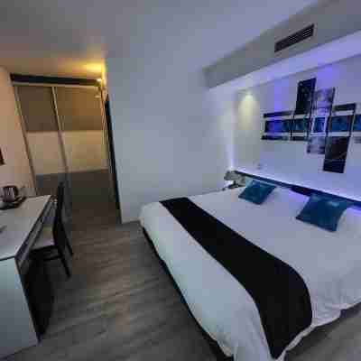 Hôtel Le Capricorne Rooms