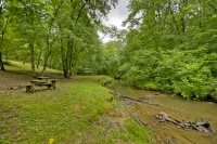 Charming Creek Front Oasis with Hot Tub and Game Room - Cozy Retreat
