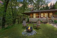 Cozy Creekside Cabin w Barrel Sauna, Covered Wraparound Deck - Pet Friendly!