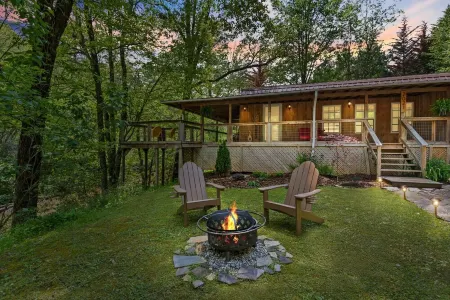 Cozy Creekside Cabin w Barrel Sauna, Covered Wraparound Deck - Pet Friendly!