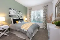 Resort-Style Pool and Rooftop Deck with Skyline Views - Elegant Oasis Hotels in Campbell