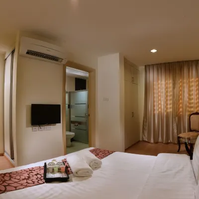 The Capital Residence Suites Отели рядом с достопримечательностью «Кампонг-Айер»