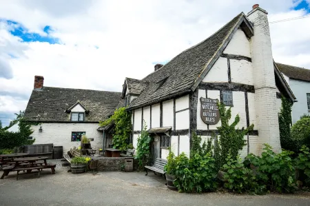 The Fleece Inn Отели рядом с достопримечательностью «Парк Броудвей Тауэр & Кантри»