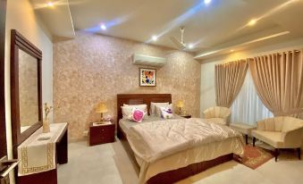 2Bedroom BahriaTown-Manzar Holiday Homes