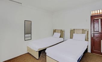 Spot on 92529 Penginapan Wisma Bintang Syariah Near MTS Al Ma'Arif Kota Bangun