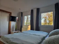 Vacation home Windschief directly behind the dike with large garden, WLAN, fireplace Hotels in Wurster Nordseekuste