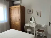 Charming outbuilding with large shaded terrace in private garden