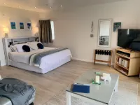 Waterfront fabulous view, spacious studio, heated pool & 10 mins walk into town.