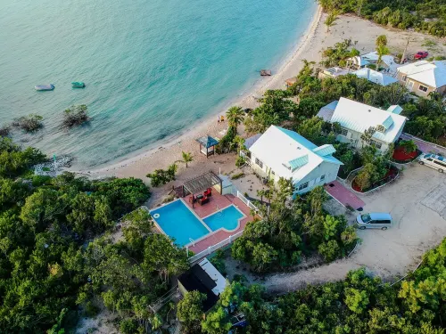 Silver Palms # 2 – Exclusive Long Bay Beachfront Retreat with Pool