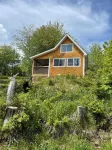 Bright and charming cabin on the Cabot Trail overlooking St. Ann’s bay.