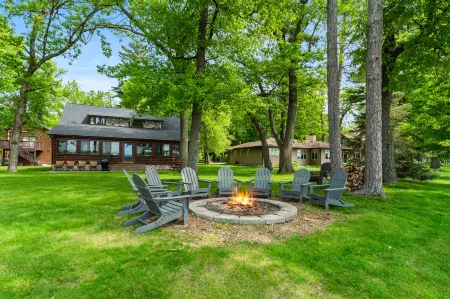 Lakeside Retreat with Canoe and Fire Pit - Inviting Tranquil Haven