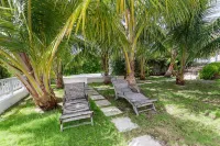 Serene waterfront house w pool, dock & beautiful sunsets - 5 min walk to beach. Hotels in 