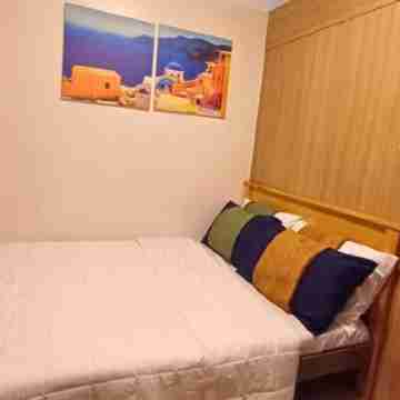 The Golden Shore Suites Rooms