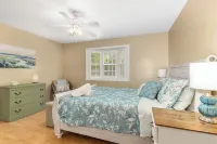 Ideal Lakeshore location in serene wooded landscape with waterfalls.