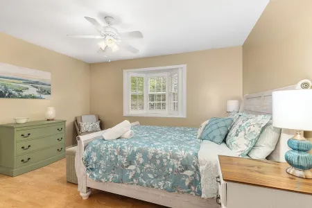 Ideal Lakeshore location in serene wooded landscape with waterfalls.