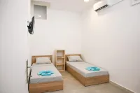 Santorini's Old Mill Serene Getaway by Pori Beach