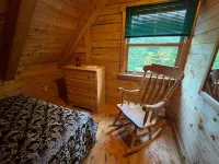Relaxing Cedar Log Cottage on Bras d'Or Lake over 300 Ft Private Beach & Kayaks