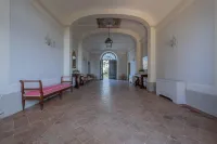 Historic villa with swimming pool surrounded by nature