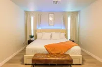 Four beds w/ 1 king, 3 queen beds each with a TV. Centrally located! No pets