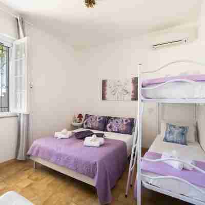 Oasi Garden House – Villetta Moderna con Giardino e Parcheggio Privato Rooms