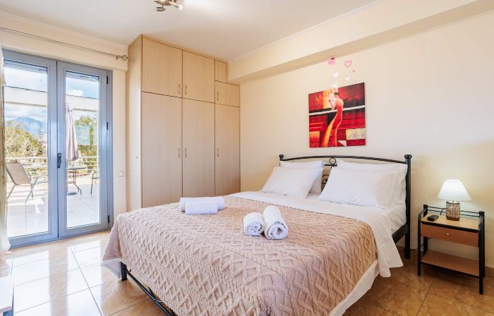 Studio with Balcony Steps from Filiatra Square