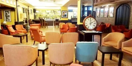 Hotel Millan Отели в г. Ames