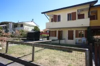 Enjoy our villa with private garden in Rosolina