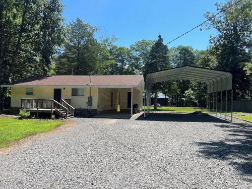 2-bedroom house in Higden with 24x30 covered  parking for boats and lake toys!!