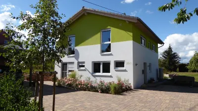 Room with private bathroom in detached house