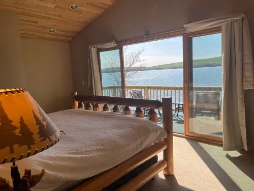 Large home on the UP's best lake! Sleeps 22! Boat to Young's Golf Course!