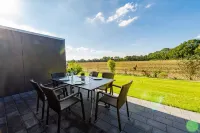 Vacation home "Wangerooge" with 102 sqm - in the vacation park Harkebrügge