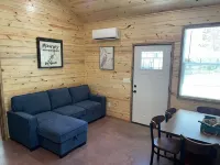 Lake view 2 bedroom cabin that sleeps 6. Private deck and fire pit area.
