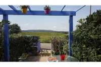 Sea and swimming pool in the natural park 1 studio cabin mezzanine garden swimming pool Hotels near Plage Saint Pierre La Mer