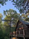 Exceptional log home on 9+ acres with frontage on Big St. Germain Lake