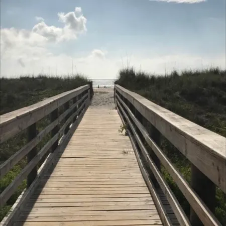 St. Augustine Beach condo, no roads to cross, just direct access to sun & surf.