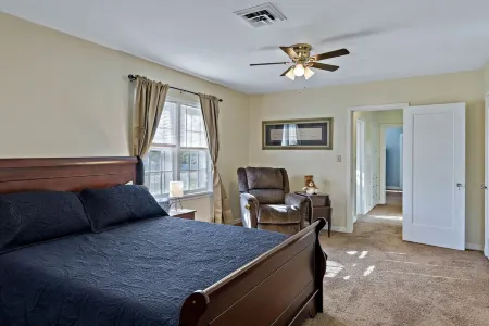 Home adjacent to Country Club, near Hospitals, Park, College and shopping.