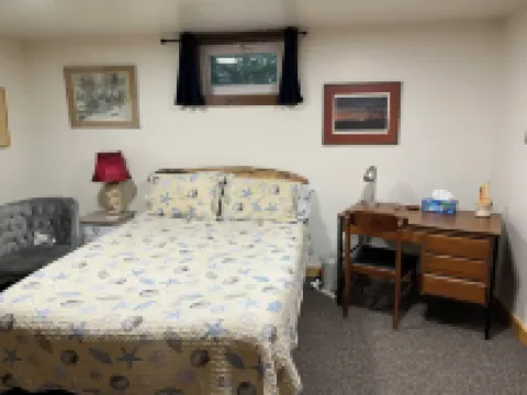 Peaceful Basement Apartment among serene woods, paths, and a stream near Acadia Hotels in Mt Desert