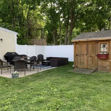 Exceptional location footsteps to beautiful downtown Mystic w/private driveway