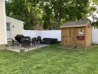 Exceptional location footsteps to beautiful downtown Mystic w/private driveway