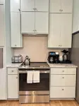Cozy 3 bed home with hot tub, garage, EV