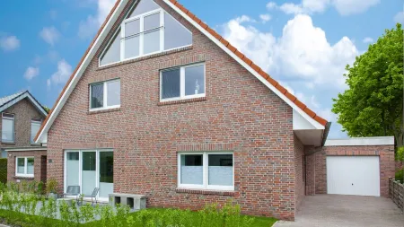 Family-friendly apartment with garden and sauna, 500 m from the beach Отели рядом с достопримечательностью «Alter Leuchtturm»